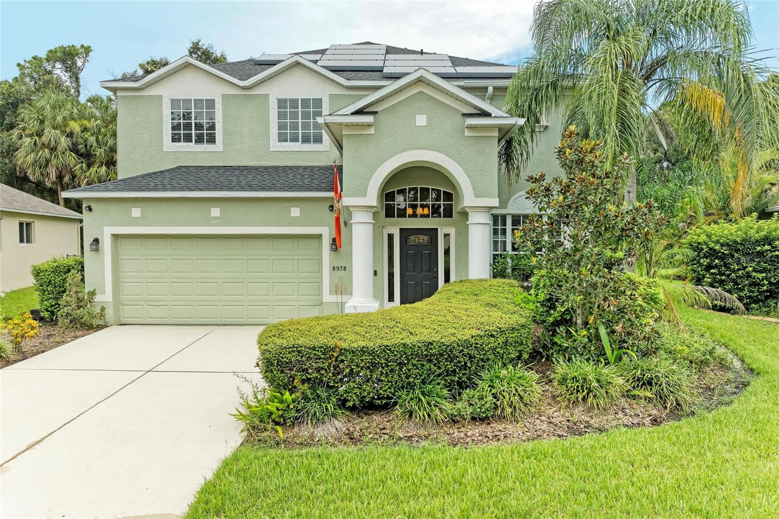 Welcome to Fairways at Imperial Lakewoods, where comfort meets convenience in a vibrant golf community with no CDD fees and low HOA dues. Golf Membership is NOT included in the HOA dues. This beautifully maintained 4 bedroom, 3.5 bathroom home offers nearly 3,000 sq. ft. of versatile living space, perfect for families and those who love to entertain. Step inside to find a large flexible room off the entryway, ideal for a formal living and dining space that flows seamlessly into the expansive kitchen and adjoining family room. A convenient half bath and laundry room are also located on the main floor. At the heart of the home, a stunning staircase leads upstairs to the oversized primary suite, complete with a cozy bonus nook that is perfect for a home office, nursery, gym, or craft space. The luxurious primary bathroom features dual walk in closets with custom shelving, a soaking garden tub, walk in shower, and dual vanities. Three additional generously sized bedrooms share two full bathrooms, providing plenty of space and privacy for family and guests. Recent updates add peace of mind including a new roof, new A/C, and solar panels that will be paid off at closing which ensures energy efficiency and long term savings. Outdoor living is easy with a screened lanai overlooking a serene conservation lot, offering a private and relaxing retreat. Ideally located just minutes from grocery stores, dining, coffee shops, gyms, and more, plus quick access to I-75 for an easy commute north or south, this home truly has it all. Do not miss your chance to own this spacious, move in ready home in one of Palmetto’s most desirable golf course communities. Some photos are virtually staged. For information regarding Golf Memberships visit https://www.golfthemoc.com.