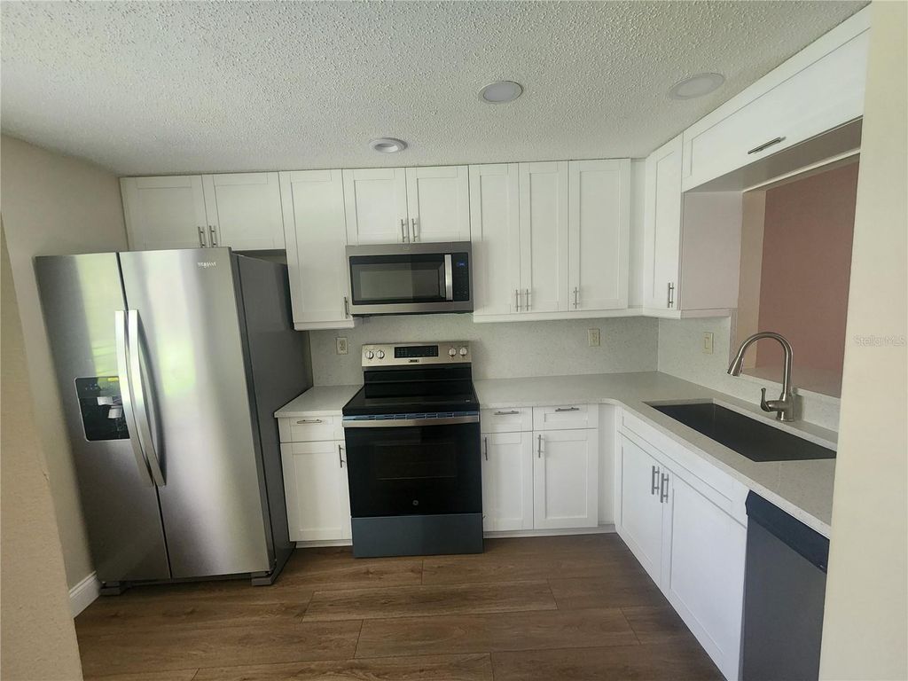 Photo of 209 Corkwood Ln, Oldsmar, FL 34677 (MLS # TB8396745)