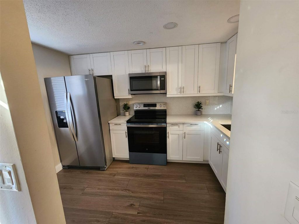 Photo of 209 Corkwood Ln, Oldsmar, FL 34677 (MLS # TB8396745)