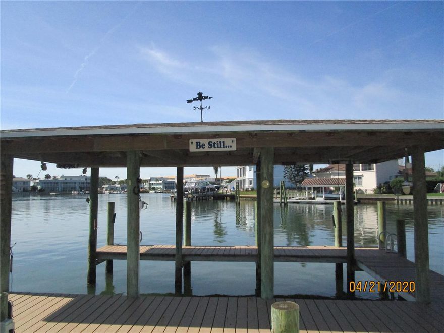 "BE STILL" is exactly what you can do here in this quiet desirable cul-de-sac location in Venezia community.  Direct riverfront property in your own private cove, with easy access to Intracoastal and the Inlet. Enjoy your own 23' covered Boat House and 27' dock. Very well maintained 2 or 3 Bedroom / 2 bath home. 3rd BR was converted to a den but can be easily changed back. Nice sized living area is light and naturally bright with skylights, with breathtaking views of the river from the large picture window. Also, there are waterfront views from the Master Bedroom! Kitchen has lots of counter space and cabinets, quartz counter tops and stainless appliances, plus river views too!  Eat in kitchen, breakfast bar plus dining area.  Sliders to oversized riverfront screen porch, where you can enjoy the manatees and dolphins. Oversized garage, 3rd garage door could be a workshop or golf cart garage. Washer & Dryer included for your convenience. Excellent Location, short ride over the bridge and you are on Flagler Ave. 2 restaurants within walking distance, Buena Vista Riverfront park, and more. Very inviting and immaculate lawn and landscaping. Available mid May for 12 month lease. Pets are negotiable. Please call Marcia or Tina to schedule your private tour and for more information 386-423-2189. Home will Be Unfurnished. Currently Tenant Occupied, please drive by.