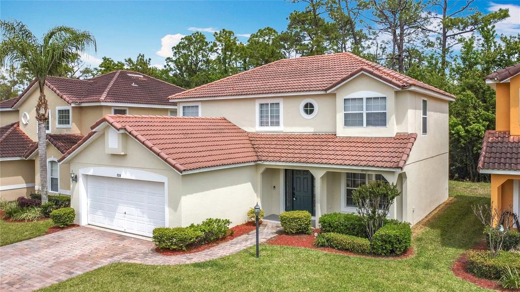 Photo of 320 Mockingbird Road, Davenport, FL 33896 (MLS # TB8367001)