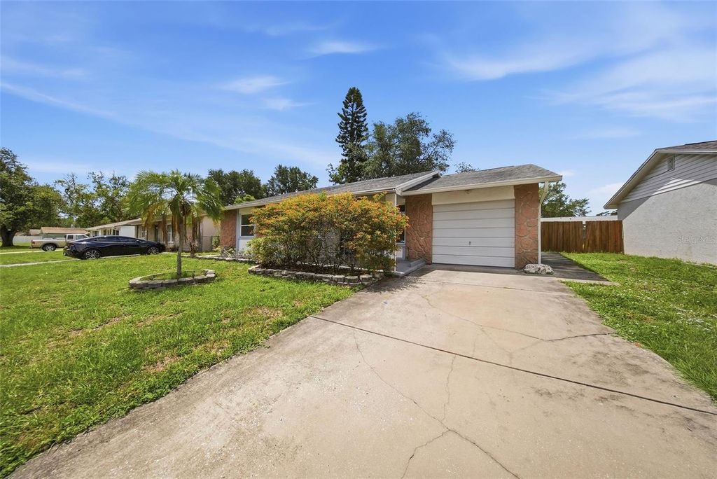 Photo of 7976 Shadow Run Drive, Largo, FL 33773 (MLS # TB8506565)