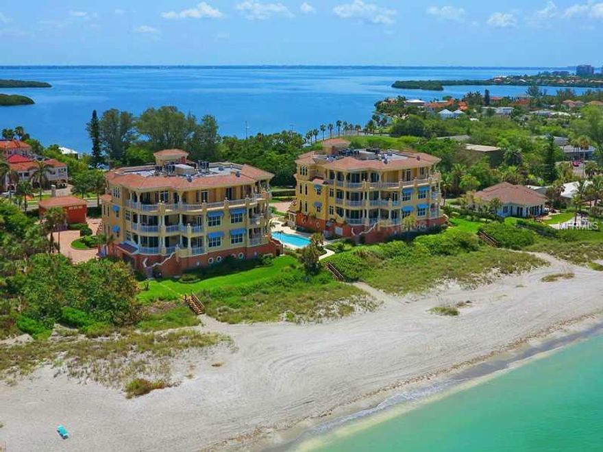 LaFirenza is arguably the most quaint community on all of Longboat Key. With only 10 fortunate ones able to call this home, it is an exclusive and private enclave that lives more like a single family home than a condo. There are 2 gorgeous buildings, each with 5 residences, and this residence has one of the best locations as it sits in the southwest corner and is only one level below the penthouse. From this vantage point there are fabulous sunset views to be enjoyed with 180 degree visibility. There are wonderful, private terraces from most rooms (great summer kitchen) allowing the outdoors to come indoors freely and making that connection to the beach and Gulf even more real and enjoyable. This particular home is spacious and has a terrific open feeling due to the very well-thought-out floor plan, the many floor-to-ceiling windows and sliders and also due to the height of the ceilings -10 and 11 feet throughout. There is an elegance to the marble flooring, beautiful lighting, gorgeous cabinetry and the other finishes of the home and yet it lives very comfortably and with an overwhelmingly serene feel. One cannot help but feel completely at ease and relaxed when they enter the home, thus making it the perfect beach getaway.  There are two master suites as well as a third bedroom, third bath and a powder room. The kitchen is a chef's delight and laid out perfectly for guests to visit around the large island while the cook is at work.  A private, climate-controlled garage able to hold 3 cars is a plus.