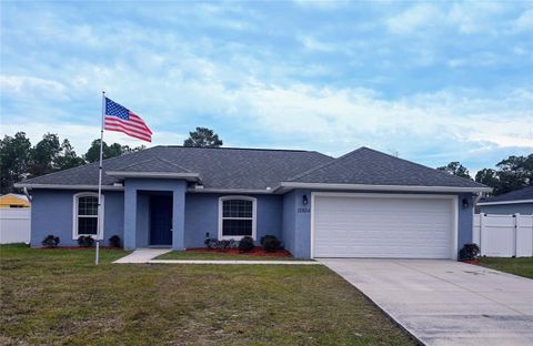 Photo of 12854 SW 77th Circle, Ocala, FL 34473 (MLS # A4663701)