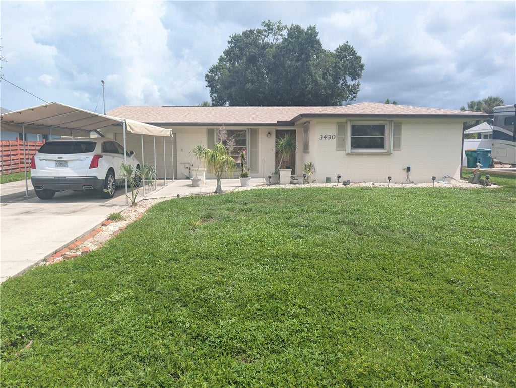 Photo of 3430 Yukon Drive, Port Charlotte, FL 33948 (MLS # C7531217)