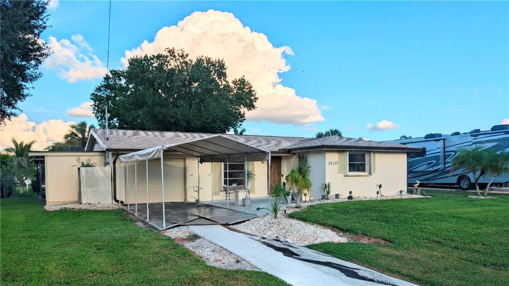 Photo of 3430 Yukon Drive, Port Charlotte, FL 33948 (MLS # C7531217)