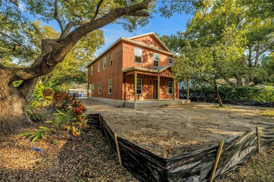Under Construction. Introducing 4333 10th St N, a new construction home by one of St. Petersburg’s most detail-driven custom home builders, Canopy Builders. Located in the Allendale community, this 5 bedroom, 4 bathroom home features a functional, open floor plan with light-filled living spaces and thoughtfully curated finishes. Designed by Canopy Builders’ in-house design team, the home showcases a classic New Orleans–inspired elevation paired with interiors that feel timeless, intentional, and comfortable for everyday living.  The main home offers 3,050 square feet and includes four bedrooms, three bathrooms, a walk-in pantry, a study with a closet that can serve as a fifth bedroom, a spacious loft, and a versatile mudroom. Above the detached two-car garage, a 526-square-foot studio ADU features a full kitchen, bathroom, and laundry hookups—providing privacy and flexibility for guests, work-from-home use, or potential rental income.  The kitchen is the heart of the home and features custom countertops and cabinetry, a white oak island with reeded apron detail, and a slab backsplash as the focal point. A gas range with custom hood and pot filler, paired with designer lighting, completes the space. Just off the dining room, the mudroom includes additional cabinetry that functions as an extension of the kitchen, along with a built-in wine cooler—creating a practical drop zone with added convenience when entering from the garage.  Upstairs, the primary suite offers a calm retreat with dual walk-in closets and a spa-inspired bath featuring a freestanding tub, walk-in shower, and carefully selected tile and stone finishes. Additional bedrooms and a loft provide flexibility for a variety of needs, while the laundry room is thoughtfully designed with built-in cabinetry, a soaking sink, and a linen closet. Thoughtful materials and finishes are carried throughout the home, reflecting Canopy’s commitment to quality craftsmanship and detail.  Conveniently located near Allendale’s neighborhood parks, downtown St. Petersburg, waterfront amenities, and local dining, this home offers easy access to everyday conveniences, cultural attractions, and major commuter routes—all while being tucked into a quiet residential setting. Targeted for completion in August 2026, this is an opportunity to get in early and explore customization options that will make the home uniquely yours.