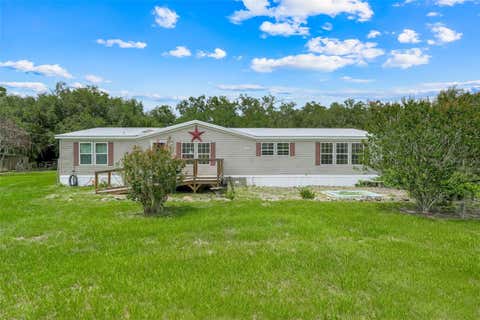 Photo of 21301 Quail Hammock Lane, Groveland, FL 34736 (MLS # G5113645)