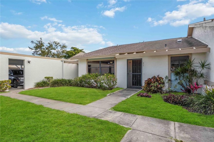 Step into the rejuvenated charm of your new home in Meadowcroft South, a vibrant 55+ community in the heart of West Bradenton. This newly listed ground-level 2-bedroom, 2-bathroom condo villa is brimming with modern updates and offers the perfect blend of privacy and comfort, with no neighbors above or below.

Inside, you’ll find a completely remodeled kitchen that shines with elegant white shaker cabinets and a matching pantry, all topped with granite countertops. A granite-topped eat-in breakfast nook invites you to enjoy cozy mornings, and brand-new stainless steel appliances complete this chef’s dream space. Both bathrooms are tastefully renovated to match the kitchen’s modern elegance, and the entire interior has been freshly painted.

A brand-new two-ton air conditioning unit, installed in December 2025, ensures year-round comfort, and updated ductwork now extends into the lanai. This expansive lanai is now a fully air-conditioned indoor-outdoor oasis, perfect for enjoying serene views of the green space and lake in any season, and bringing the total cooled living area to nearly 1,500 square feet.

For added convenience, the condo fee covers a host of amenities: internet, cable, sewer, water, trash, a sparkling community pool, and all the beautiful landscaping maintained by the association. You’ll also enjoy a deeded covered carport and ample guest parking, ensuring a truly maintenance-free lifestyle.

Located just minutes from the beaches of Anna Maria Island, top dining, shopping, and natural attractions, this condo is perfectly positioned for enjoying the best of Bradenton living.

Don’t miss your chance to make this beautifully updated and spacious condo your own—schedule your private showing today!