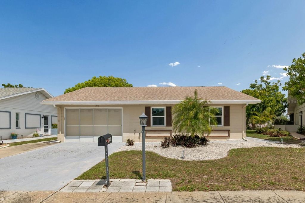 Photo of 209 Genet Court, Sun City Center, FL 33573 (MLS # TB8494958)
