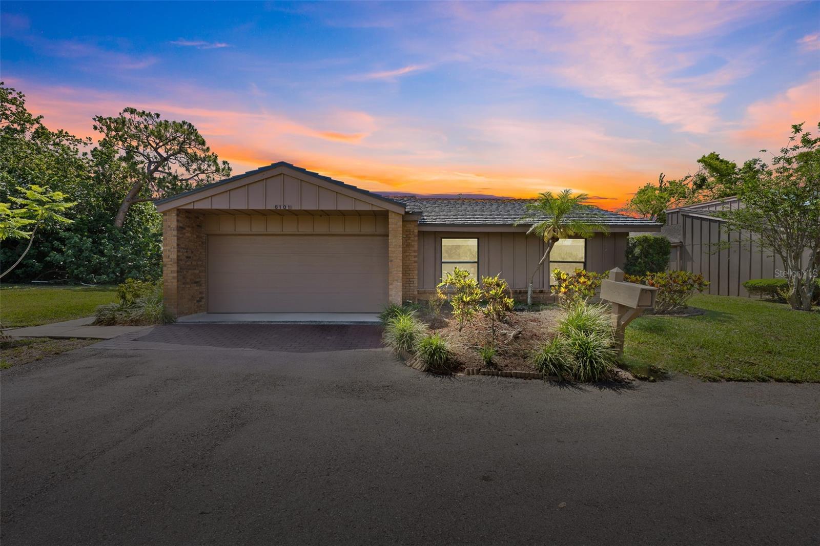 Follow the scenic winding majestic oak-lined street as you find your way to this exceptional Bradenton property located in The Oaks. This beautiful pool home perfectly blends spacious interiors with an unparalleled outdoor living experience. This three-bedroom, two-bath pool home also comes equipped with an office, two-car garage and new 2025 metal roof. The home is meticulously designed for grand-scale entertaining and comfortable, everyday living. From the moment you arrive, you’ll notice the ideal home placement at end of the cul-de-sac with minimal neighbors, and lush tropical landscaping creates a serene and welcoming ambiance. Enter inside to discover a thoughtfully designed floor plan that offers elegance and functionality. A large formal living room and dining room combination provides a sophisticated space for hosting guests, with ample room for gatherings of any size. For those who work from home, a designated office space offers privacy and quiet needed for productivity. The inviting family room flows seamlessly into the well-appointed kitchen. This casual, open-concept area is for relaxed evenings and creating culinary delights, ensuring you're always part of the conversation. The centerpiece of this remarkable home is the expansive outdoor sanctuary. A large private pool awaits within a full-screen enclosure, offering year-round private enjoyment. The generous covered lanai features distinct areas for dining and lounging, creating an extension of your living space. Incredible indoor-outdoor flow is achieved through multiple sliding glass doors providing direct access to this paradise from the primary bedroom, formal living room, dining room and kitchen, making it the ultimate venue for entertaining or personal relaxation. This home continues to impress with its practical amenities. An attached two-car garage provides convenience and security for your vehicles, while a separate exterior storage shed offers ample space for tools and recreational gear. This community is minutes from energetic downtown Bradenton with countless entertainment and dining options, the renowned IMG Academy, adventurous Robinson Preserve, local golf and country clubs, Warner’s Bayou Boat Ramp for quick access to the Manatee River leading directly into the Gulf of Mexico, plus the white sand beaches of Anna Maria including Holmes Beach and Bradenton Beach. Don't miss the opportunity to make this exceptional Bradenton residence your slice of paradise.