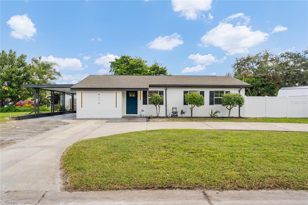 Photo of 4112 W Wallace Avenue, Tampa, FL 33611 (MLS # TB8546304)
