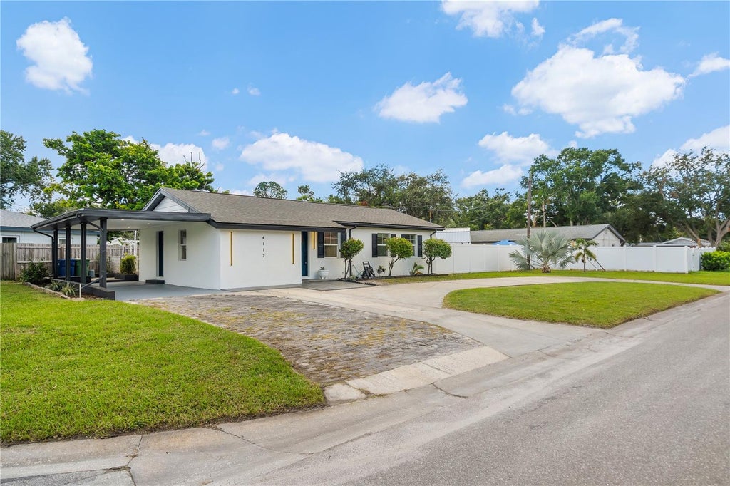 Photo of 4112 W Wallace Avenue, Tampa, FL 33611 (MLS # TB8546304)