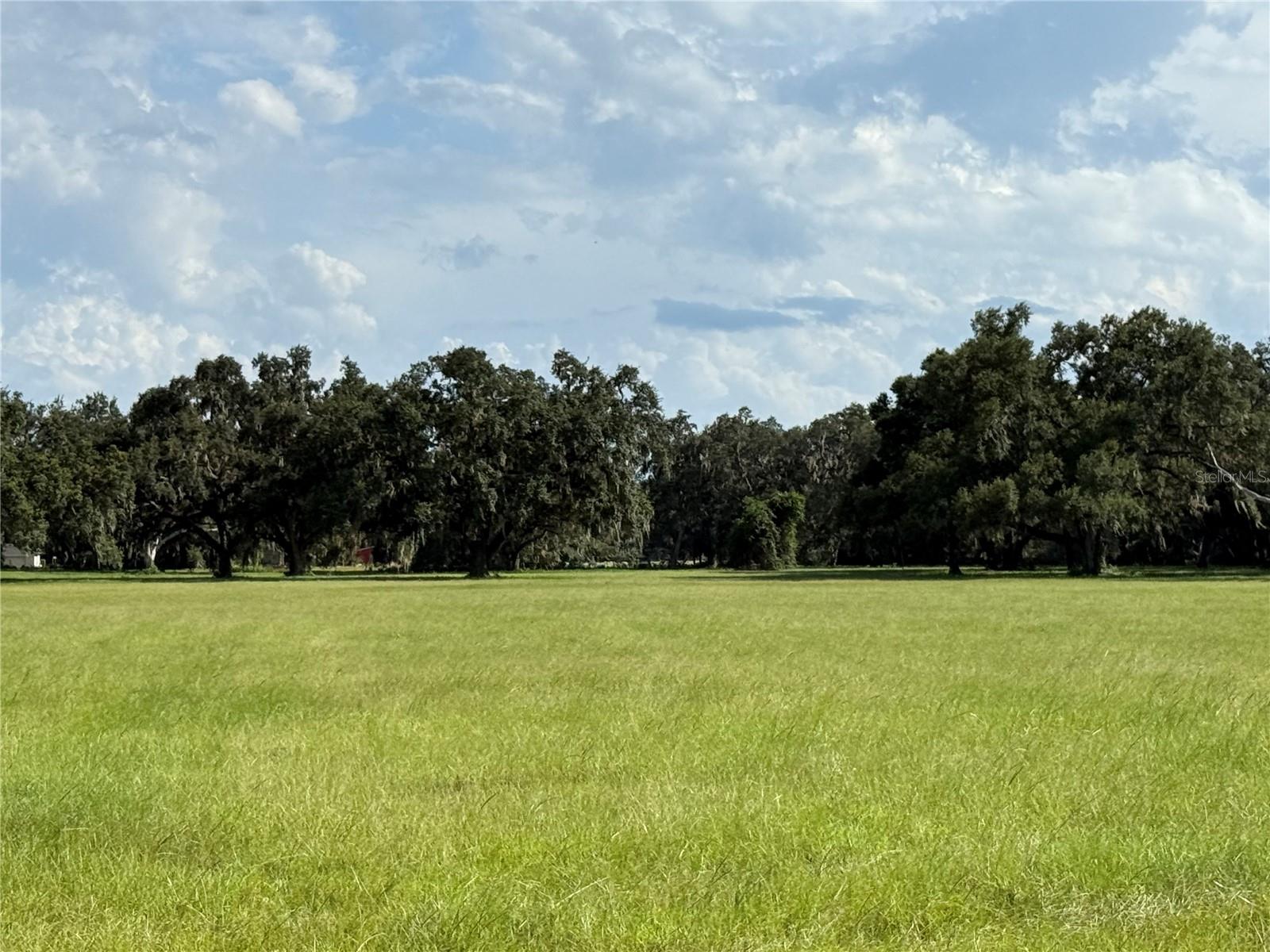 5.32+/- acre property presents great opportunity. With nearby access to shops, dining, and major highways, you can enjoy the best of small-town living while staying connected. A perfect chance to invest in the charm and future growth of southern Sumter County.