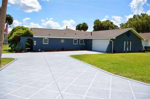Photo of 1102 N Palmetto Street, Leesburg, FL 34748 (MLS # G5113105)