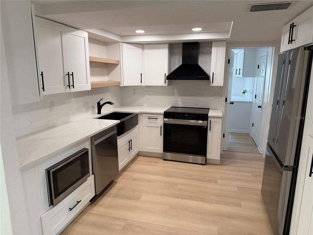 Photo of 3352 Honeymoon Lane, Holiday, FL 34691 (MLS # W7883842)