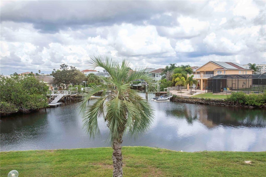 Photo of 4609 Marine Parkway #203, New Port Richey, FL 34652 (MLS # W7884837)