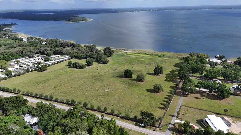 Photo of Tbd SE Sunset Harbor Road, Weirsdale, FL 32195 (MLS # OM726618)