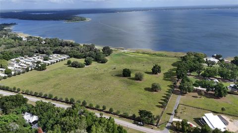 Photo of Tbd SE Sunset Harbor Road, Weirsdale, FL 32195 (MLS # OM726618)