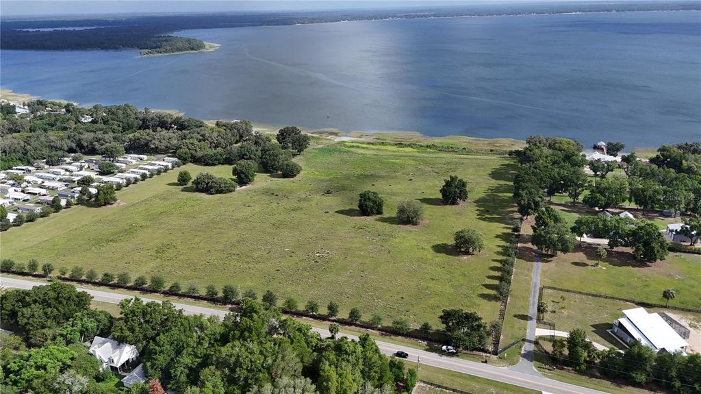 Photo of Tbd SE Sunset Harbor Road, Weirsdale, FL 32195 (MLS # OM726618)