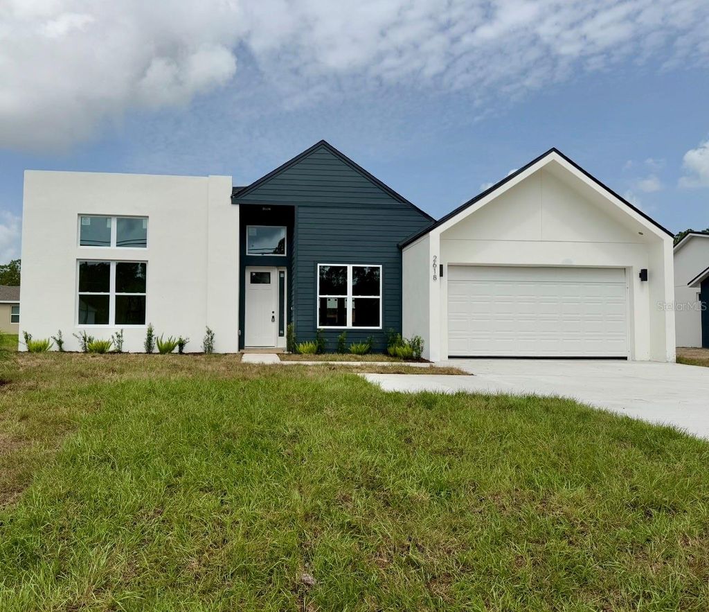 Photo of 2618 De Groodt Road SW, Palm Bay, FL 32908 (MLS # O6348452)