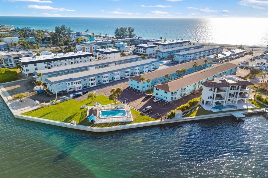 Welcome to your opportunity to own a piece of island living just steps from the Gulf of Mexico. Ideally positioned on the north end of Bradenton Beach, this well-maintained 1-bedroom, 1-bath condominium offers the perfect combination of location, lifestyle, and flexibility.

Situated between the turquoise waters of the Gulf and the tranquil beauty of Sarasota Bay, this property allows you to enjoy the best of both worlds. Spend your mornings walking along the white sand beaches just moments away, and your evenings relaxing by the bayfront while watching boats pass by and sunsets reflect across the water.

The community offers a waterfront pool overlooking Sarasota Bay, landscaped courtyard areas, and convenient on-site parking. Whether you’re looking for a personal coastal retreat, seasonal getaway, or an income-producing property, this unit provides valuable flexibility with monthly rental opportunities and no ownership waiting period.

Additional features include a turnkey furnished interior, updated systems, and impact-resistant windows for added peace of mind. The association includes flood insurance, helping to reduce one of the major ownership expenses typically associated with island properties.

Located within proximity to local restaurants, shops, and entertainment, and with easy access on and off the island, this property delivers both convenience and the relaxed coastal lifestyle buyers are searching for.

Whether you’re seeking a beachside escape, a seasonal residence, or an investment in one of Florida’s most desirable coastal markets, this is an opportunity to own in a location that continues to attract visitors year-round.

MOTIVATED SELLER