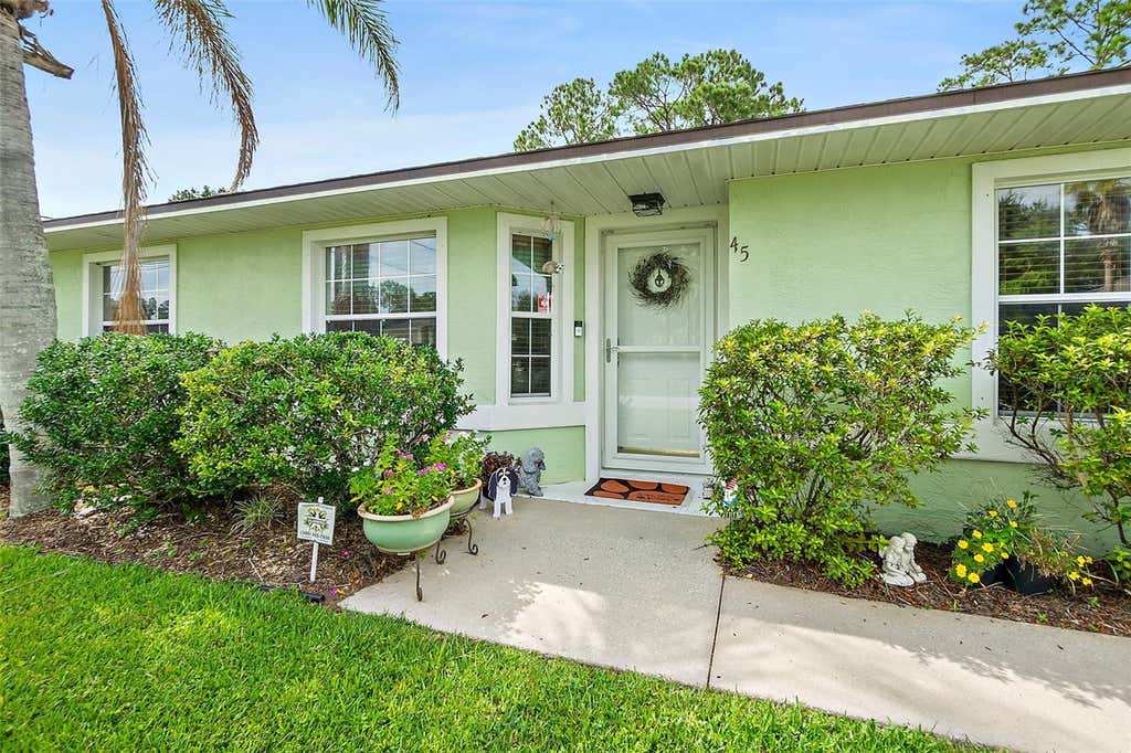 Photo of 45 Pershing Lane, Palm Coast, FL 32164 (MLS # FC320510)