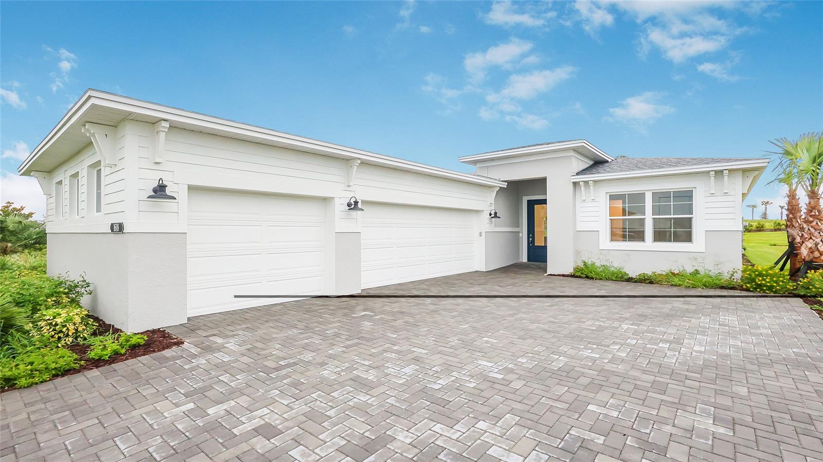 **NEW CONSTRUCTION** This stunning Laura floorplan offers 3 bedrooms, 3 bathrooms, a versatile Flex room, and a spacious 3-Car garage. The owner’s suite bath and bathroom 3 feature frameless shower enclosures, complemented by upgraded pebble tile shower flooring, all bathrooms showcase tile extending to the ceiling and enhanced plumbing fixtures, adding to the luxurious feel. Throughout the main living and flex spaces, wood-look tile plank flooring creates a warm, stylish ambiance, while the laundry room is elevated with decorative floor tile for a touch of artistry. At the heart of the home, the chef-inspired kitchen with frameless European-style cabinetry, a contrast-colored island knee wall cabinet wrap, and upgraded large crown molding. A 24-inch-deep cabinet above the refrigerator with a side panel ensures extra storage and functionality. The 3cm white quartz countertops and artisan backsplash in a specialty finish add sophistication to this thoughtfully curated space. Nestled in a gated community, Cresswind at Lake Harris enjoy amenities such as 8 championship pickleball courts, Grand clubhouse with state-of-the-art fitness center, Resort-style swimming pool with lakefront views and Marina access on pristine Lake Harris.