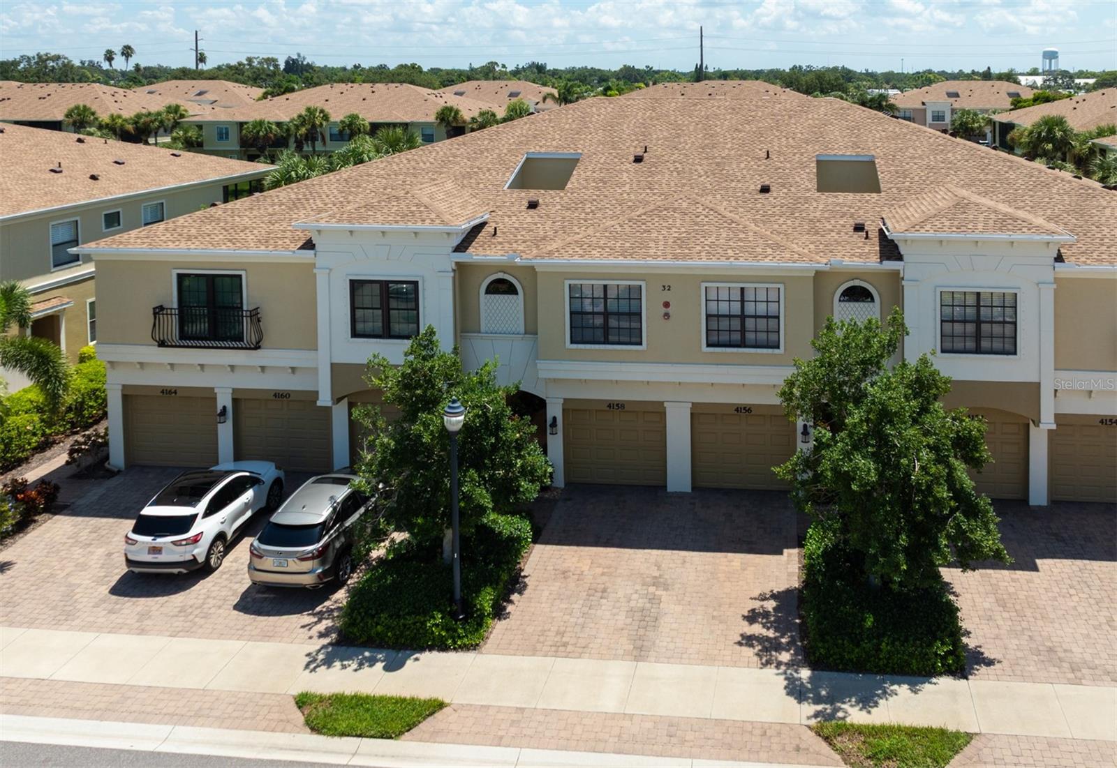 Welcome to your new home in the heart of PALMA SOLA TRACE! This charming 3-bedroom, 2.5-bath, two-story condo offers 1,520sqft of comfortable living space, a 1-car garage, and even the OPTION TO BE SOLD FURNISHED so you can settle in right away. Step inside and you’ll notice how open and inviting it feels! The knee wall between the dining and living rooms has been removed, creating a
true open-concept space. Tall ceilings, crown molding, wainscoting in the dining room, and a tray ceiling add just the right touch of style. Large windows let in plenty of light and relaxing pond views from your main living area and screened in patio. Upstairs, you’ll find all three bedrooms, including a spacious primary suite. The home has been well cared for with a 2022 HVAC, 2022 ROOF and located in a NON FLOOD ZONE so you can move in with peace of mind. Living in Palma Sola Trace means more than just a great home, you’ll enjoy a heated community pool, fitness center, playground, walking trails, and sidewalks. The clubhouse hosts regular events, making it easy to
meet neighbors and feel part of the community. And the location? You’re just MINUTES AWAY FROM ANNA MARIA ISLAND, downtown Bradenton, and everyday conveniences like Publix, Walmart, Target, Aldi, and more. Come see for yourself why this could be your perfect next home! CHECK OUT THE VIRTUAL TOUR HERE: https://youtu.be/HHThLJZb0TY?si=3lre4lVBgQte4gQj