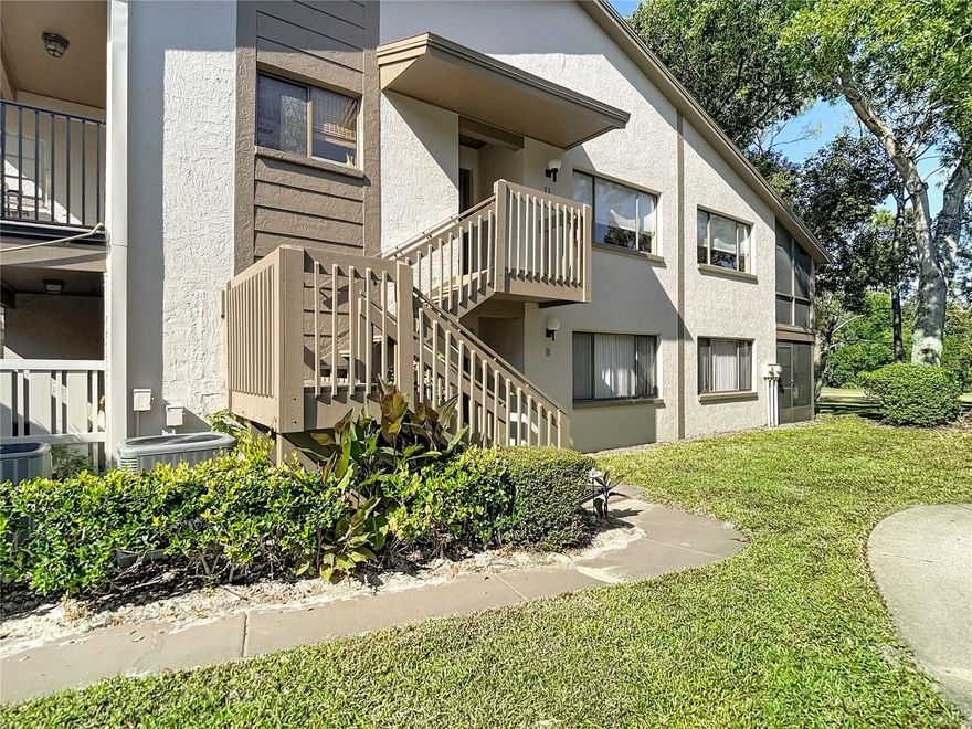 This is an age 55+ second floor condo with excellent views of the serene & beautiful golf course. The open floor plan has an efficient kitchen, large enough for a small table. The is a open porch off the kitchen that is enjoyable for your morning coffee. The laundry facilities are in a closet in the kitchen so it is easy to prepare meals while doing a load of wash. This floor plan is open to the dining area and living room making it feel spacious. In addition, there is a cozy side room that was originally designed as the dining room. But most owners use this as extra space for crafts, reading or other activities. The bedrooms are split being in opposite ends of the unit so quiet and privacy are assured. The guest room has a full bath conveniently next to it. The primary bedroom has an ensuite full bath. There are views of the golf course and trees- very peaceful. The living room has a screened porch that also overlooks the golf course. There is a dedicated carport to keep your car out of the sun and weather. The condo complex has its own pool, hot tub and shuffleboard as well as a community center. The condo complex is part of the much larger and desirable Beacon Woods. Beacon Woods is built around a picturesque golf course. The Beacon Woods community has winding roads and mature trees with many ADDITIONAL amenities such as: heated pool, lighted tennis and pickleball courts, basketball, play area, exercise room, bocce ball and more. The clubhouse has many activities including but not limited to: dances, cards, yoga, and seasonal gatherings. The monthly fee for this condo is only $410 per month that covers ALL of this: exterior maintenance, garbage, water, sewer, cable tv with Internet, pool, shuffleboard and dues for the larger Beacon Woods community. Your only utility bill will be the electric you use. Sweet! There are maintenance personnel on grounds everyday in case the exterior of the condo complex needs attention. This condo has one of the best run Boards. Major upgrades have been made to the complex and the condo budget has sufficient reserves for future maintenance. There are no major improvements needed, keeping your monthly costs low with NO future surprises. All dimensions are approximate and buyer is urged to confirm items of significance to them. All appliances ARE included and the furniture is available for purchase as well. The furniture is NOT included in the list price but if you like it, just make an offer!  It is a joy to live here. This is one of the best values in this community. Buyers are urged to verify all information deemed important to them and to review association documents. All dimensions are approximate. The unit can be rented after 2 years of ownership. One buyer must be aged 55 or older. All buyers are vetted in a in person interview. No dogs allowed but other quiet pets are permitted. If you have a service dog, there is a strict vetting process. See the Board for the most recent rules. Note there are vehicle restrictions rules for trucks, motorcycles, campers trailers, commercial vehicles, boats and boat trailers. See board rules for full details. This is a great place to live and the best value in this subdivision.  Don't miss this one!
