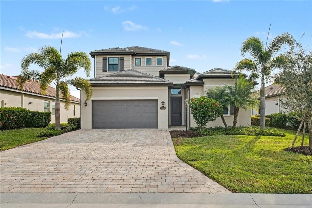 Photo of 5713 Cheech Glen, Lakewood Ranch, FL 34211 (MLS # A4678572)