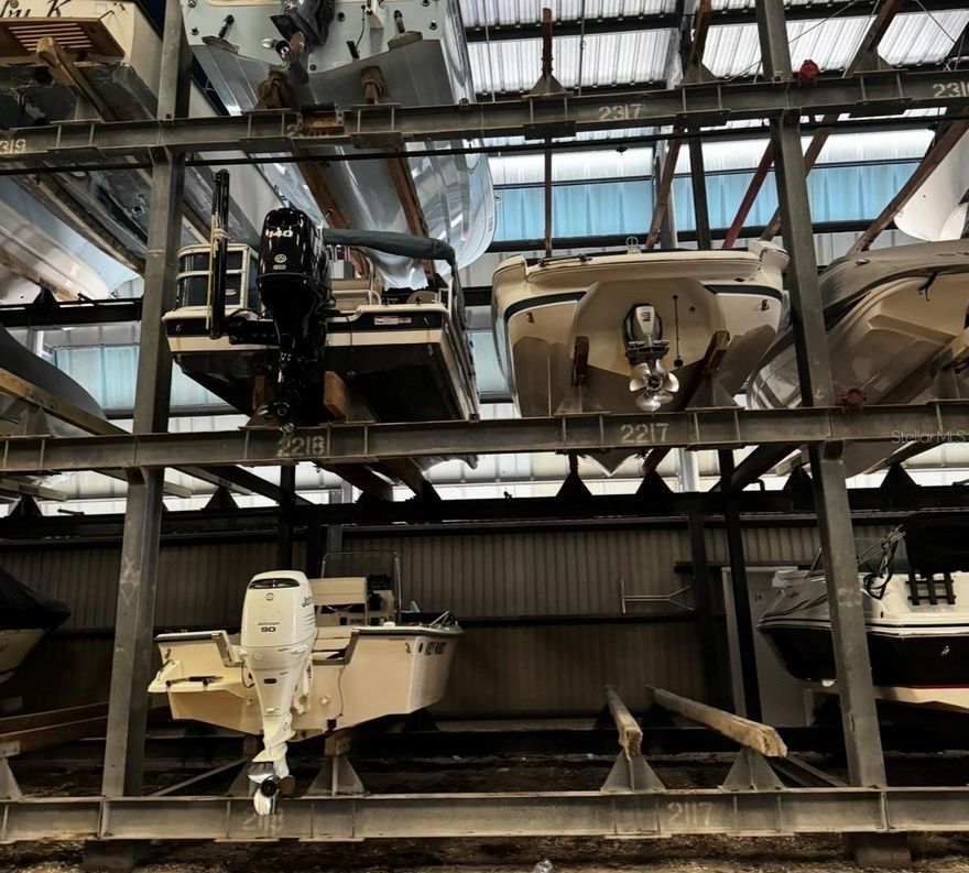 Welcome to Slip #2218 at The Boathouse on Longboat, a rare opportunity on the coveted south end of Longboat Key! This is your chance to secure a covered, hurricane-protected slip in one of Sarasota's most desirable waterfront locations. This premium slip accommodates boats up to 30 feet in length, with a maximum height of 7 ft 8 in and a 8.6 ft beam (No T-tops unless collapsible). Enjoy first-class service at an affordable monthly rate with unbeatable amenities. Located just minutes from both Sarasota Bay and the Gulf, this facility offers on-site fuel, restrooms, a ship store, maintenance services, leasing assistance, and even the popular Dry Dock Waterfront Grill restaurant on site. Simply call ahead and your boat will be launched, fueled, and waiting for you. At the end of the day, return to dock and watch as the team expertly rinses and stores your boat in its covered slip.This is more than boat storage, it's effortless boating in paradise. Don't miss your chance to own high and dry covered storage on Longboat Key.