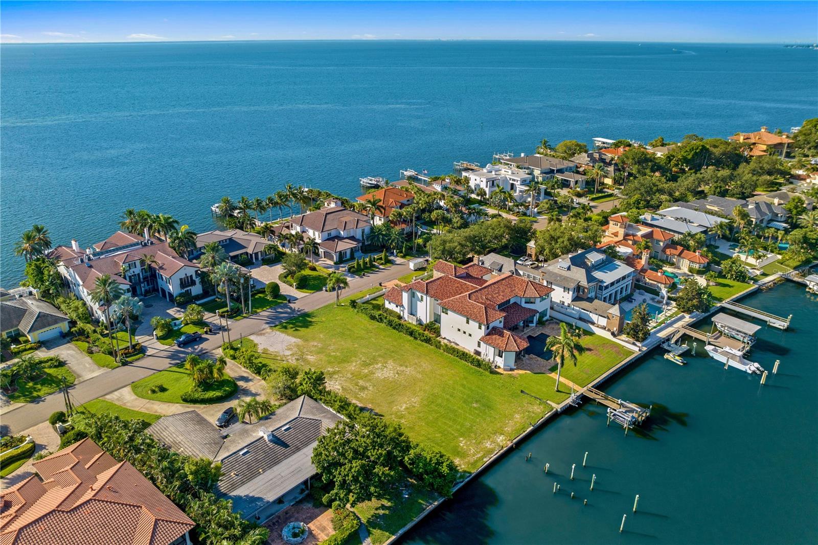 RARELY AVAILABLE Brightwaters Blvd. waterfront property in the exclusive Snell Isle community of St. Petersburg with a BRAND NEW SEAWALL. Enjoy breathtaking sunsets, harbor views, and protected waters, making this an ideal location for serious boaters. Build your dream home on one of the largest waterfront lots available, spanning approximately 0.43 acres with about 100 feet of water frontage. This prime location offers direct access to Tampa Bay and the Gulf of Mexico, with no bridge height restrictions, allowing for easy navigation of larger vessels. Conveniently located near downtown St. Petersburg, the St. Pete Pier, award-winning beaches, the historic Vinoy Renaissance Hotel and Golf Club, Tampa International Airport, shopping, and fine dining. Explore the endless possibilities of this grand waterfront property. Floor plans available upon request. Seize this rare opportunity for decadent Florida Coastal Living!