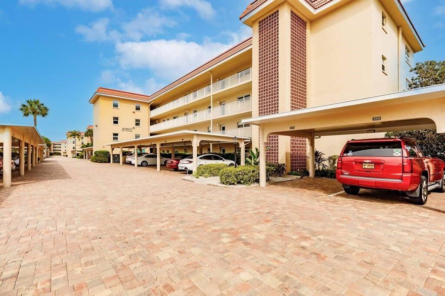 55+ Harbor View Haven on Siesta Key w/beach access!

Discover relaxation and adventure at our Siesta Harbor condo on Siesta Key. This bright 2 bedroom unit offers modern comfort and stunning harbor views from the screened porch. Enjoy deeded beach access and watch breathtaking sunsets. You'll have access to amenities like a fishing pier, boat slips, a pool, and clubhouse activities. Whether you're boating, fishing, or enjoying community events, your stay will be unforgettable.

The master bedroom boasts a queen bed, TV, ensuite bathroom, and a walk in closet, along with access to the screened porch. The second bedroom also has a queen bed and shares a bathroom with a tub/shower combo. The bright living room includes a TV, while the fully equipped kitchen and dining area offer all the amenities needed for a delightful stay. Enjoy the covered and screened porch area, perfect for sipping your morning coffee or watching the boats in the harbor.

As a guest at our Siesta Harbor condo on Siesta Key, you'll have access to a variety of amenities designed to enhance your stay. The Siesta Harbor community offers a fishing pier, perfect for those who enjoy fishing or simply being by the water. For boating enthusiasts, boat slips are available for vessels up to 30 feet, with direct access to the Intercoastal Waterway (monthly fee applies).

The clubhouse features a library and pool table, and hosts various community activities. You'll also have access to a heated swimming pool and hot tub for a refreshing swim or a relaxing soak, as well as a shuffleboard area and grills for outdoor fun and dining. Enjoy deeded beach access to the pristine sands and beautiful sunsets of Siesta Key Beach and Crescent Beach. Beach chairs are also onsite in the unit for your use.

The building includes an elevator for convenient access and a same-level laundry room for guests' use. Experience the perfect blend of relaxation, community engagement, and coastal living at our Siesta Harbor condo.

Welcome to your home away from home in beautiful Siesta Key! This 2-bedroom, 2-bathroom condo is designed for comfort and relaxation. The master bedroom boasts a queen bed, TV, ensuite bathroom, and walk-in closet, along with access to a serene covered porch. The second bedroom also has a queen bed and shares a bathroom with a tub/shower combo. The bright living room includes a TV, while the fully equipped kitchen and dining area offer all the amenities needed for a delightful stay. Enjoy the covered and screened porch area, perfect for sipping your morning coffee or watching the boats in the harbor. Book your stay and experience the tranquility of Siesta Harbor!

**PLEASE NOTE** Rates vary by week/season. Additional fees and taxes apply. During the months of January, February, and March, check-in & check-out dates are only allowed on the first and last day of those months.