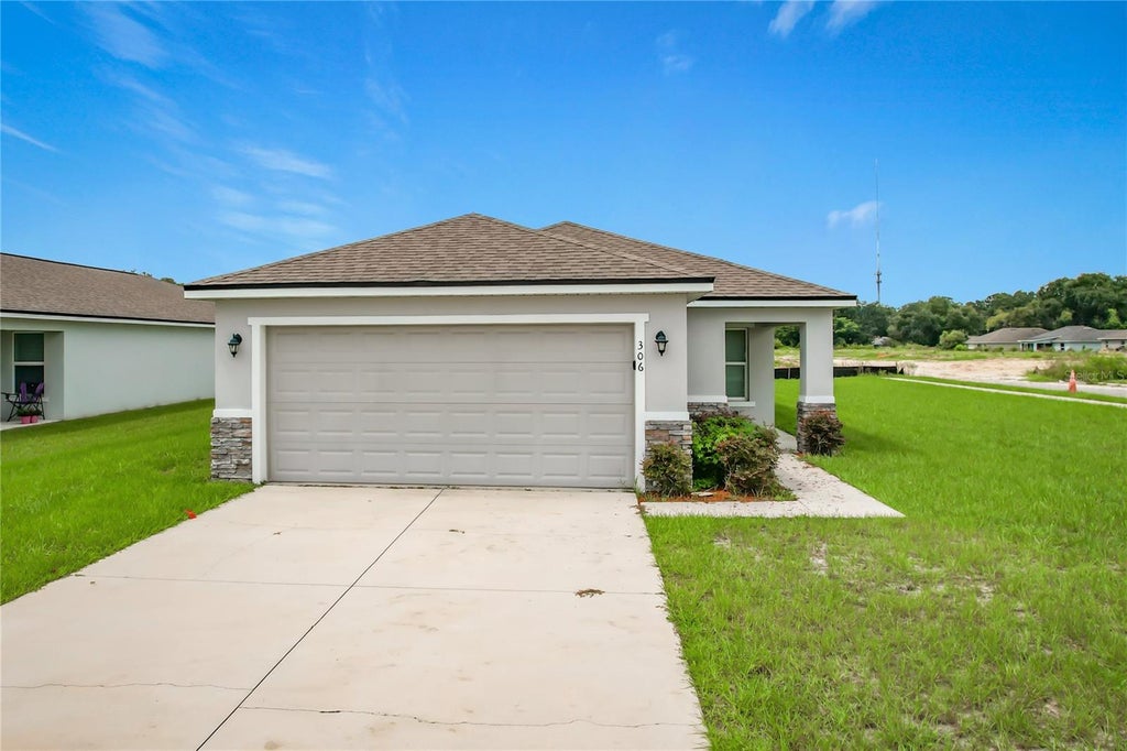 Photo of 306 Judy Lane, Auburndale, FL 33823 (MLS # C7530865)