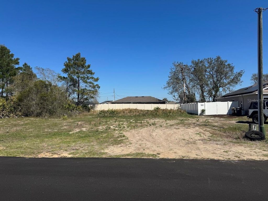 Photo of 311 Hibiscus Drive, Poinciana, FL 34759 (MLS # O6402690)
