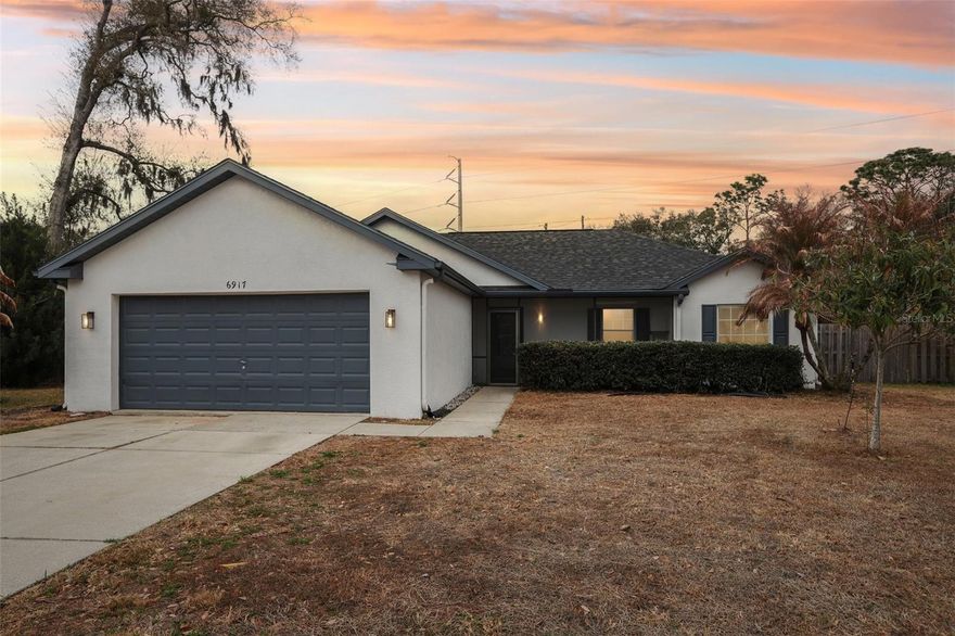 Move-in Ready Home with 3 bedrooms 2 baths 2 car garage offering a screened-in FRONT PORCH and a LARGE FLORIDA ROOM in the back with a FENCED-IN BACKYARD. This home offers a high ceiling with a SPLIT FLOOR PLAN. The Master Bedroom has dual closets with en suite bathroom with separate shower and tub. On the other side you have TWO Secondary Bedroom Sharing a Second Bath. Laundry Room is inside between Garage and Kitchen. The Kitchen boast lots of counter space surrounded by cabinets for storage that opens up to the living area and the Florida Room. Backyard is Fenced-in with a Large Shed for additional storage. New Roof Installed in 2023. LOW HOA, Flood Zone X and NO CDD. This Home is in a Small Subdivision that is close to the schools, hospital and major highways including SR 54 and US 301.