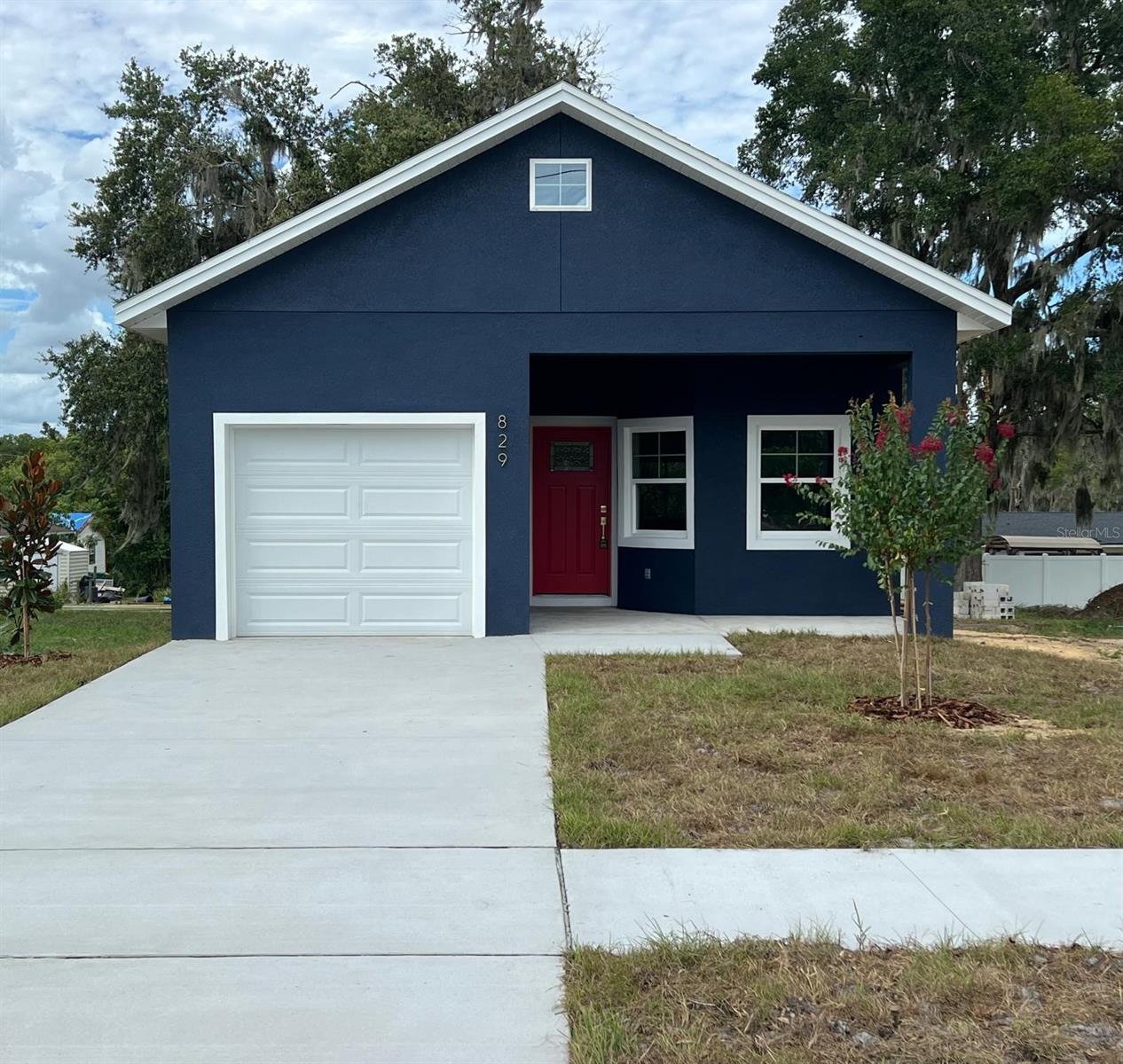 ********New Construction******* Seller offering up to $5,000 towards closing costs or rate buydown*******Welcome to this brand new 3 bedroom, 2 bath home in the heart of Eustis! with no HOA and just minutes away from charming Downtown Eustis, this modern gem offers 1,154 sq ft of stylish living space. Enjoy a cozy electric fireplace, an open layout with quartz countertops, luxury vinyl flooring, and elegant gold fixtures. The beautiful navy- blue exterior adds curb appeal, making this home ideal for first- time buyers or those looking to downsize. Don't miss your chance to own a stunning new construction home in a prime location-this one truly shines!