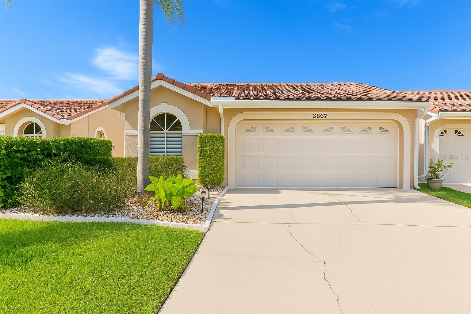 Located in one of Palm Harbor’s most desirable neighborhoods, this villa offers a spacious open-concept layout with 2 bedrooms, 2 bathrooms, a versatile bonus room, and a screened lanai overlooking a peaceful canal. Unlike many neighboring properties, this home is outside of a flood zone. The kitchen is bright and open, featuring additional cabinetry not typically found in similar homes, providing extra storage and functionality. A durable tile roof, block construction, and stucco exterior provide long-term protection and peace of mind, with routine maintenance already in place. All major appliances have been recently updated and will remain with the home, along with a Pentair water conditioning system. The primary suite includes a generous walk-in closet and an en-suite bath with dual vanities. The community’s low HOA fee covers lawn care, exterior maintenance, internet, trash, and access to a clubhouse and resort-style saltwater pool, heated for year-round enjoyment. Perfectly situated, the neighborhood strikes a balance between tranquility and convenience just minutes from fine dining, shopping, and everyday essentials. A recent 4-point inspection (October 2024) confirmed the home is in excellent condition.