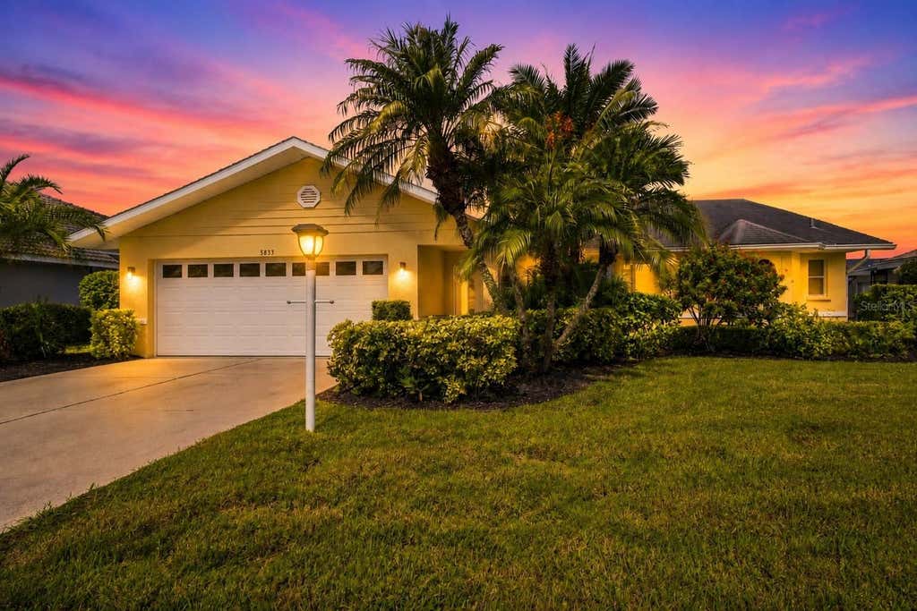 Photo of 5833 Carriage Drive, Sarasota, FL 34243 (MLS # A4702760)