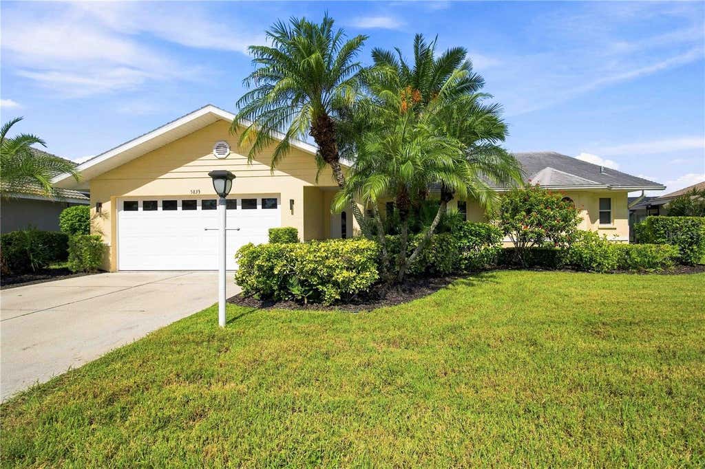 Photo of 5833 Carriage Drive, Sarasota, FL 34243 (MLS # A4702760)