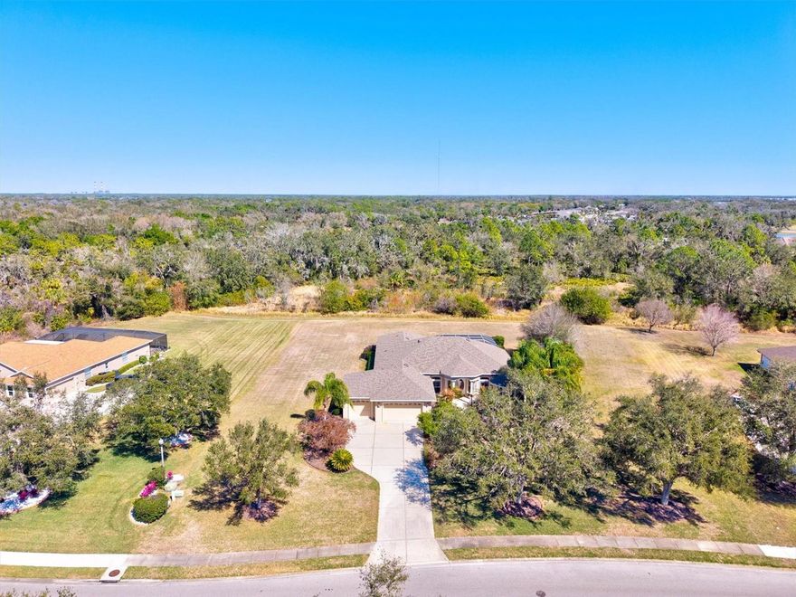 Location, lifestyle, and land — this Parrish beauty truly has it all! Situated on over 1 acre of private property backing to preserve, this spacious 3,200+ sq ft home offers the perfect blend of space and serenity in one of the area’s most desirable locations. Featuring 4 bedrooms plus a large bonus room (ideal as a den, office, media room, or 5th bedroom), 3 full baths, and a 3-car garage, this home was designed for comfortable living and entertaining. You’ll love the open floor plan with soaring high ceilings, abundant natural light, and seamless flow to the outdoor living space. Step outside to your private backyard retreat complete with a sparkling pool, relaxing spa, expansive patio, and covered lanai — perfect for entertaining or enjoying peaceful evenings under the stars. The third full bath functions beautifully as a convenient pool bath. The oversized primary suite offers a true escape with a massive en-suite bathroom featuring dual vanities, a large soaking tub, and plenty of space to unwind. Additional highlights include a NEW ROOF and a highly functional layout that provides both privacy and gathering space. Perfectly positioned in Parrish with convenient access to Tampa, St. Petersburg, and Sarasota — and just minutes from everything to enjoy in Lakewood Ranch — Shopping, dining, and amenities while still experiencing the quiet charm of country-style living. Space. Privacy. Location. This is Florida living at its best. Come check it out!