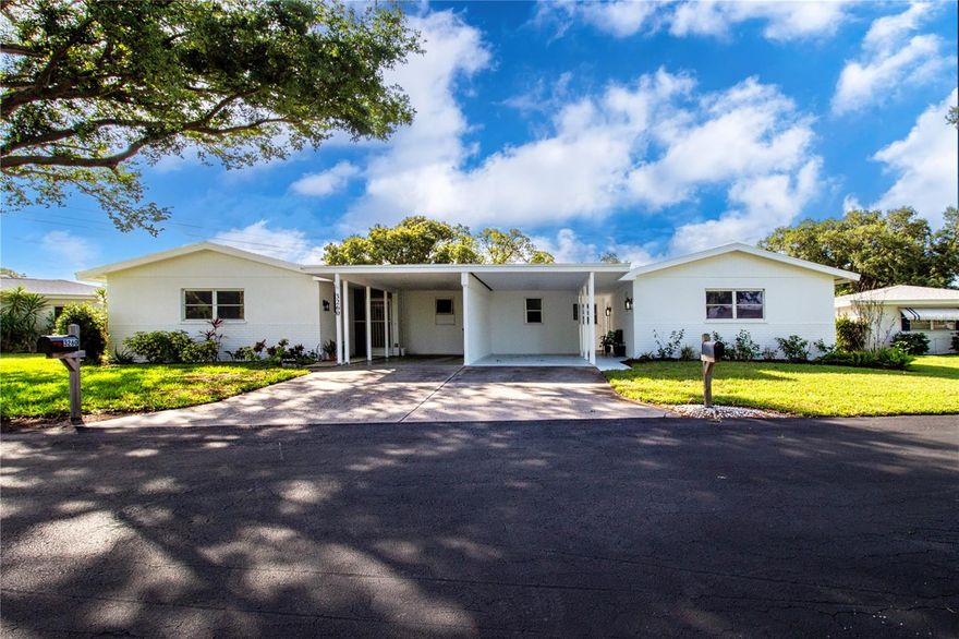 Welcome to 3252 Westford Lane — LOW $175 monthly HOA in Gulf Gate Gardens Homes in Sarasota, Florida! (Kitchen photos virtually staged with alternate wall color) A wonderful opportunity in one of Sarasota’s most desirable Gulf Gate neighborhoods, this 2 bedroom, 2 bath villa presents comfortable Florida living with a functional layout and peaceful greenbelt view from your private patio and bonus room.  Inside, 1,131 sq ft of space, this one story home showcases a floor plan that flows effortlessly from room to room with generous living spaces for everyday living or seasonal stays. Inside, you’ll find comfortable living spaces and ample indoor storage — perfect for modern convenience. The home features plenty of closet/cabinet/pantry space, a clean layout, and excellent natural light throughout. There is also a carport and large indoor utility/laundry room. For the chef in the family the kitchen offers stainless steel appliances, a kitchen island for ease everyday or entertaining. Enjoy a greenbelt view in a peaceful community setting. Low maintenance fees making this residence ideal for first time buyers, downsizers, or snowbirds seeking a low upkeep Sarasota home. Well maintained property features include: Roof 2017, (2) exterior doors (side and rear) w/ blinds between glass, impact glass 2017, A/C 2020, Exterior painted 2022, Exterior motion light 2026 new, All outlets and rocker switches 2017, All wood blinds and woven window treatments, All Door hardware inside and out 2017, Guest Bathroom toilet 2019, Shut off valve at water heater 2019, Garbage Disposal 2019, Stainless Appliances: Whirlpool Range 2026, Refrigerator 2026, Bosch Dishwasher like new, Whirlpool Microwave like new. Air conditioner has been consistently maintained and new UV light installed  2026 and carbon filtration system added in 2026 ($2k).   All interior has been painted (walls and ceilings), Great Room/Dining/Florida Room low maintenance solid surface stained concrete. Carpet and upgraded pad in bedrooms (pad has the waterproof barrier on top between pad and carpet 2017. Storage room new cabinetry and plumbed for utility sink. Exterior- all re-landscaped, Exterior patio wood look deck tiles and metal privacy trellis 2026, All interior and exterior lights 2021, Private Mailbox.    Location & Community Highlights:  Prime Gulf Gate Gardens location with easy access to Gulf Gate Village, Legacy Trail, YMCA/Potter Park, Costco; close to dining, shopping, and services. High walkability score. Minutes from the world famous Siesta Key Beach and nearby cultural hotspots. • Low monthly HOA that covers grounds maintenance and irrigation.   From its quiet greenbelt setting to its proximity to beaches, trails, and conveniences, this home offers the best of Gulf Gate living in Sarasota.