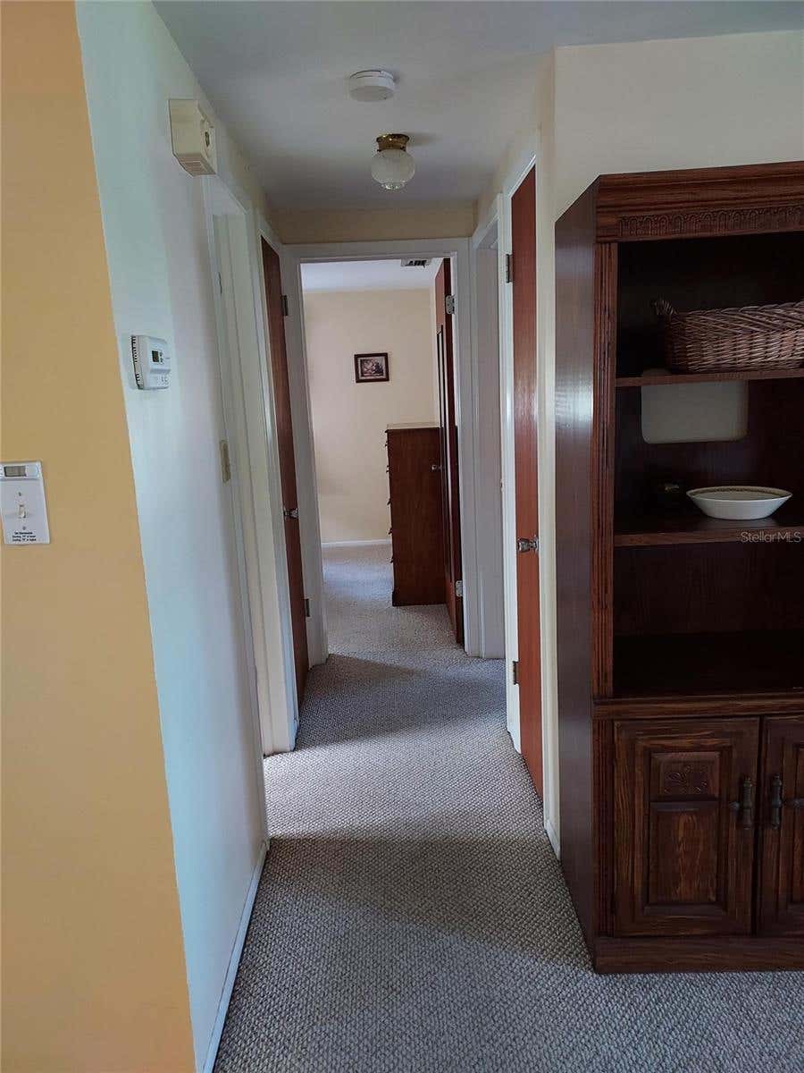 Photo of 1240 Chelsea Lane, Holiday, FL 34691 (MLS # O6415458)