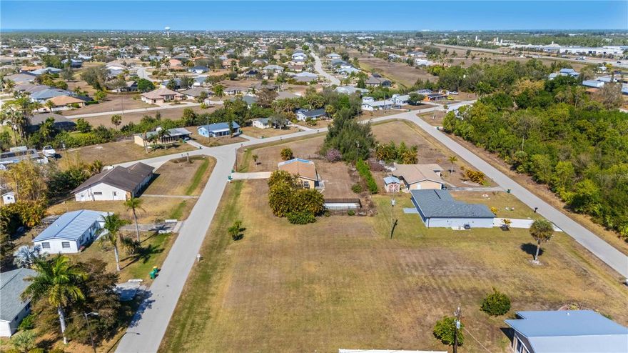 Great opporutnity for nearly half an acre in the growing community of South Punta Gorda Heights. Located just minutes from I-75 and downtown Punta Gorda, these FOUR vacant lots offer a convenient location with easy access to shopping, dining, and entertainment. Only 6 miles from Fisherman's Village and 7 miles from the new Sunseeker Resort. May also be purchased with other lots on the same street as well!