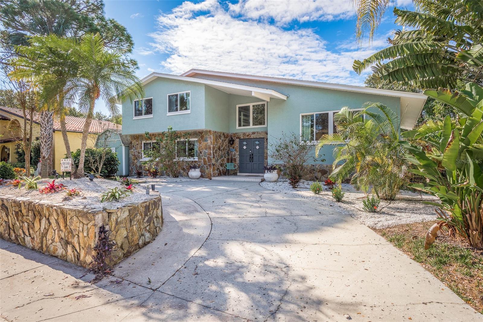 This home is not only a wonderful place to live, but also a high-performing, turnkey investment property in the prime Whispering Pines neighborhood—with no HOA and located in unincorporated Pinellas County.
This fully updated, income-producing property offers a rare blend of style, function, and proven cash flow. Over $110,000 in upgrades have been completed in recent years—including major mechanicals (2021–2024), roof (2023, with GAF Golden Pledge Warranty), kitchen renovation (2022), pool refinishing (Pebble Tec) and pool equipment (2022), full interior painting (2022), and professional landscaping (2022). See attached feature sheet for the full upgrade list.
This home comes with smart home technology, including: two smart thermostats, Wi-Fi-controlled pool heater, FLO smart main water valve control/monitor, and Ring doorbell.
Currently leased month to month at $7,500/month (tenants pay utilities; owner pays pool/landscaping), this home delivers a 6.3% cap rate at the listing price. It also has a proven short-term rental history with annual revenue of $165,000 in 2024 and a cap rate of 9.7% at listing price. The property's unique layout, high-end updates, and desirable location made it a consistent top performer in the STR market. Financials available upon request.
During Hurricanes Helene and Milton, there was no water intrusion inside the home, backyard, or pool. Guests stayed comfortably in between the hurricanes and after Milton.
The home’s flexible layout spans multiple levels. The first floor features two bedrooms, a flex space, a full bath, laundry room, and storage room—offering the potential to serve as an in-law suite with a private entrance. There is also access to the family room with a cozy woodburning fireplace and wet bar. Two French doors open to an inviting, resort-style backyard.
The outdoor space is an entertainer’s dream, with a large covered deck that seats 12+, a heated Pebble Tec pool with shallow and deep ends, new pavers, a gazebo, and a fire pit area for cool evenings.
A half-flight of stairs leads to the heart of the home: a remodeled kitchen with bold blue cabinetry, quartz countertops, marble backsplash, deep black sink, bar seating, and vent hood. A breakfast nook offers peaceful views of the pool and backyard—an ideal spot to start your day.
The spacious great room features soaring ceilings, luxury vinyl plank flooring, and a seamless living and dining area. Upstairs, you'll find four more bedrooms, including the master suite with a private en suite bath, and an additional bathroom with double vanities and a laundry chute.
Located on a quiet, dead-end street with no rear neighbors and wetland views, this exceptional home is a proven, turnkey income-generating opportunity in a sought-after neighborhood—truly offering the best of Florida living. Whether you're expanding your portfolio, looking for a dual-use property (personal + rental), or planning to make this your dream forever home, this house delivers on performance and flexibility.
The home is offered fully furnished (subject to buyer interest/negotiation).