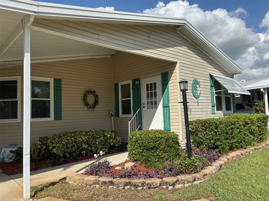 Photo of 6107 Grand Oaks Drive SE, Winter Haven, FL 33884 (MLS # P4934363)