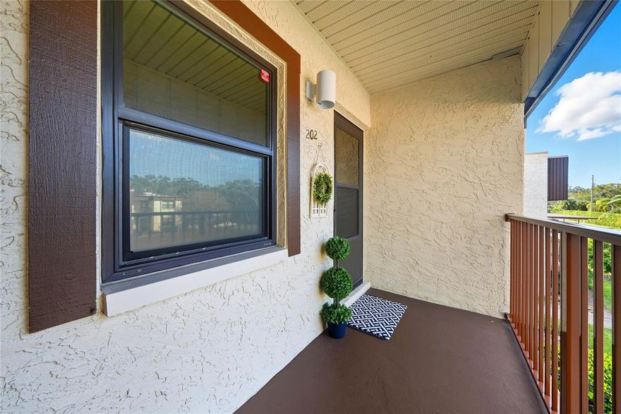 This condo is fully furnished and has been meticulously decorated with modern furniture, artwork and updates galore.  Come see this completely furnished move-in condition condo and make it your own.  Welcome to paradise and enjoy living in this 2 bedroom, 2 bathroom condo with lots of living space and storage.  The kitchen has granite counter tops, custom built-in cabinet space for a coffee bar with pull out drawers for additional storage in this beautiful kitchen. Both bathrooms have custom cabinets and new lighting. Both bedrooms are split floor plan with private bathrooms for each bedroom for additional privacy and convenience for your guest.  The living room has brand new dining table, luxurious couch with ottoman coffee table and television with TV Stand.  Both Bedrooms are spacious with engineered wood floors, new bedroom sets, furnishings, artwork and decorations for that coastal decor to enjoy this fantastic opportunity to own a fully furnished condo in Clearwater near the beach and a heated pool to enjoy all year long. This building has a brand new roof 2025, new 2020 HVAC system and new washer and dryer.  This condo is like buying a brand new home and is located in a active community that has lots of great features.  You can enjoy access to a private heated pool, hot tub, shuffleboard and pickleball or tennis courts.  There is a clubhouse that has kitchen and meeting rooms and rec room to play pool or ping ball.  Conveniently located just 5 miles to Honeymoon Island State Park and world-class beaches, shopping, dining and more.  Don't miss your chance to live the vibrant Florida lifestyle you've always dreamed of.  Schedule your private showing today!