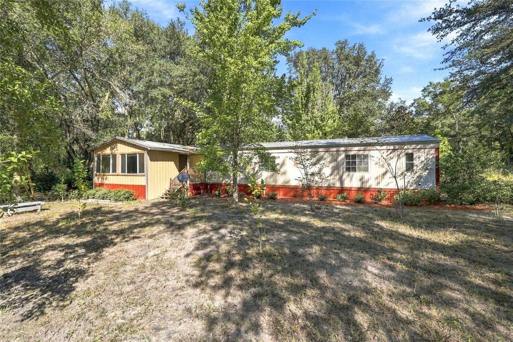 Photo of 3877 SW Herlong Street, Fort White, FL 32038 (MLS # GC544152)