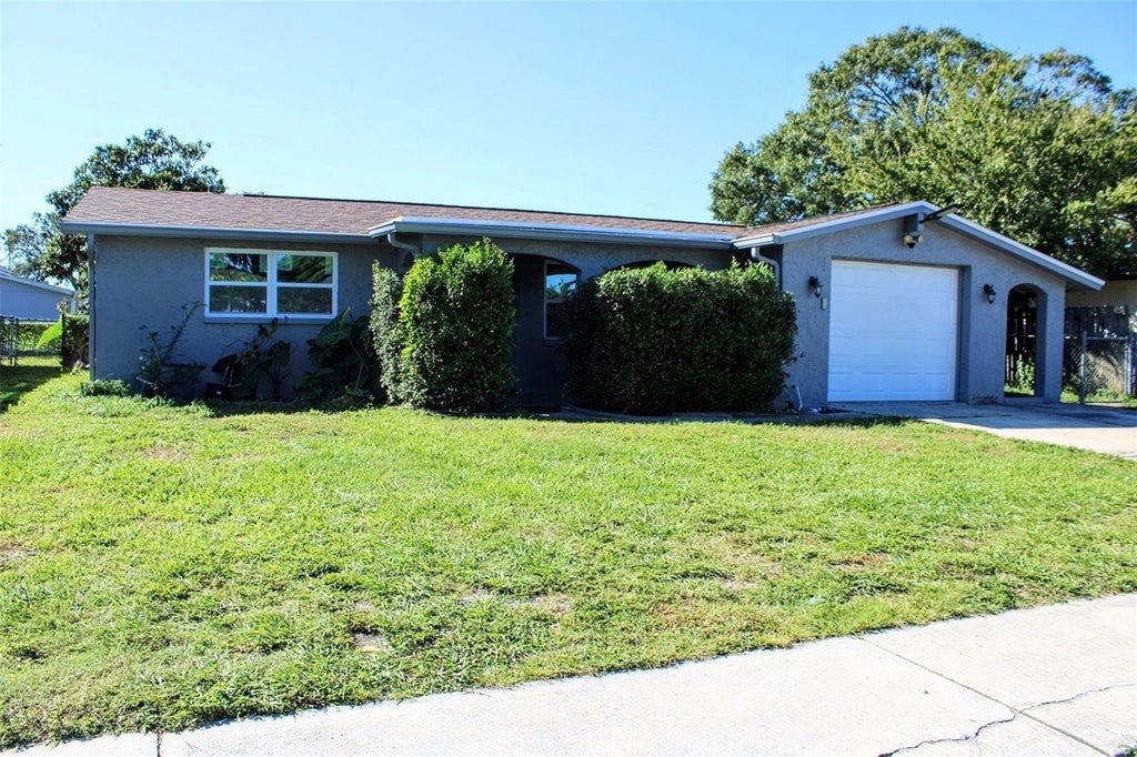 Photo of 7234 Westcott Drive, Port Richey, FL 34668 (MLS # TB8560802)